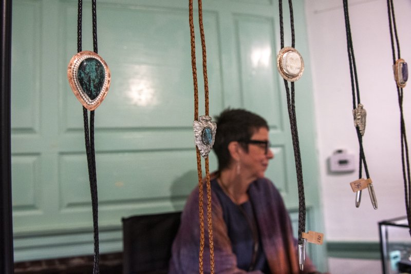 Sandy Calderone uses globally sourced stones, combined with metal work.